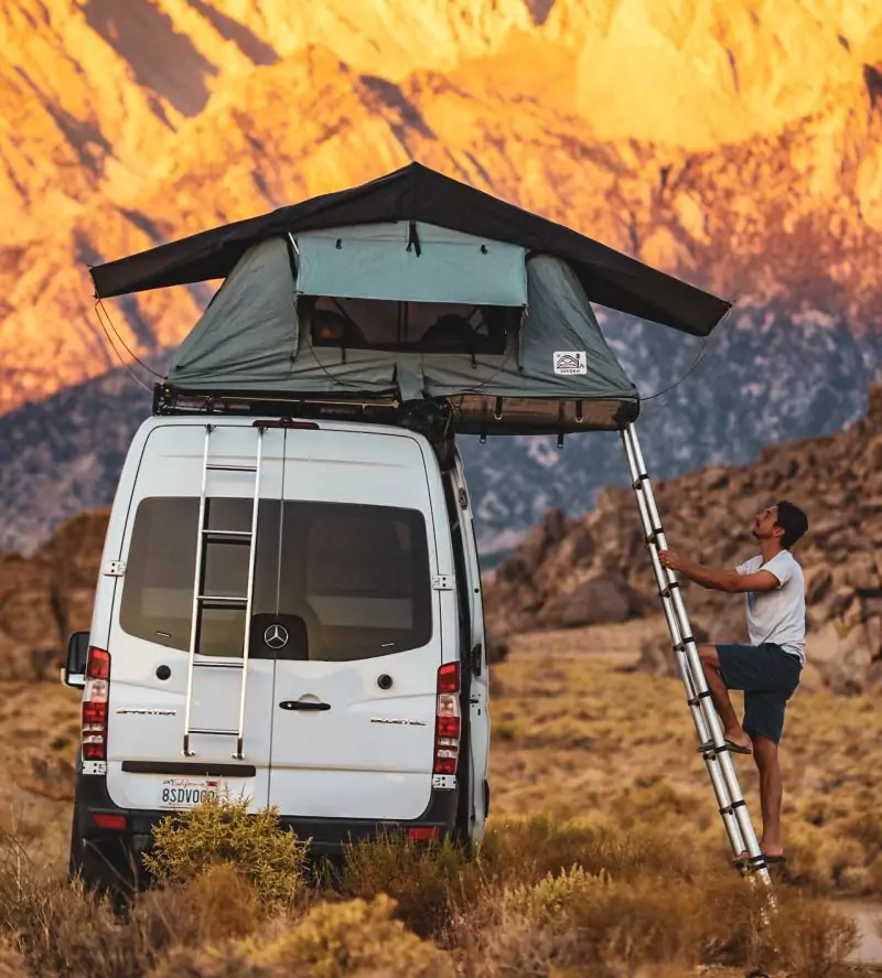 Four season two-person tent; 2.5" built-in mattress; includes roof racks, & 10' telescoping ladder extension